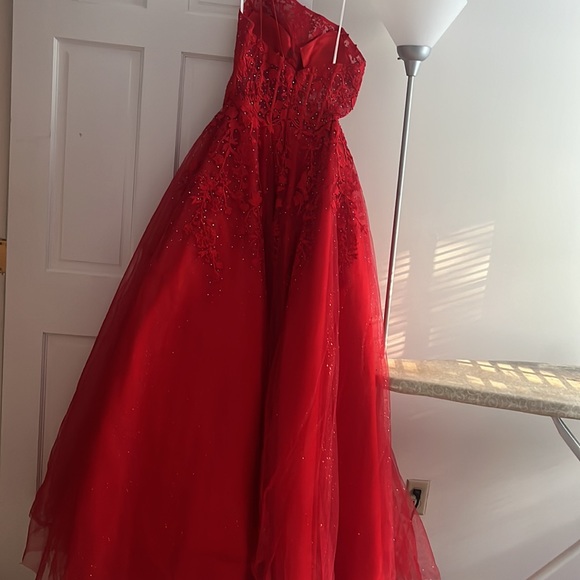 Long red pageant gown with blue iridescent sequins and flower embroidery - Picture 6 of 7